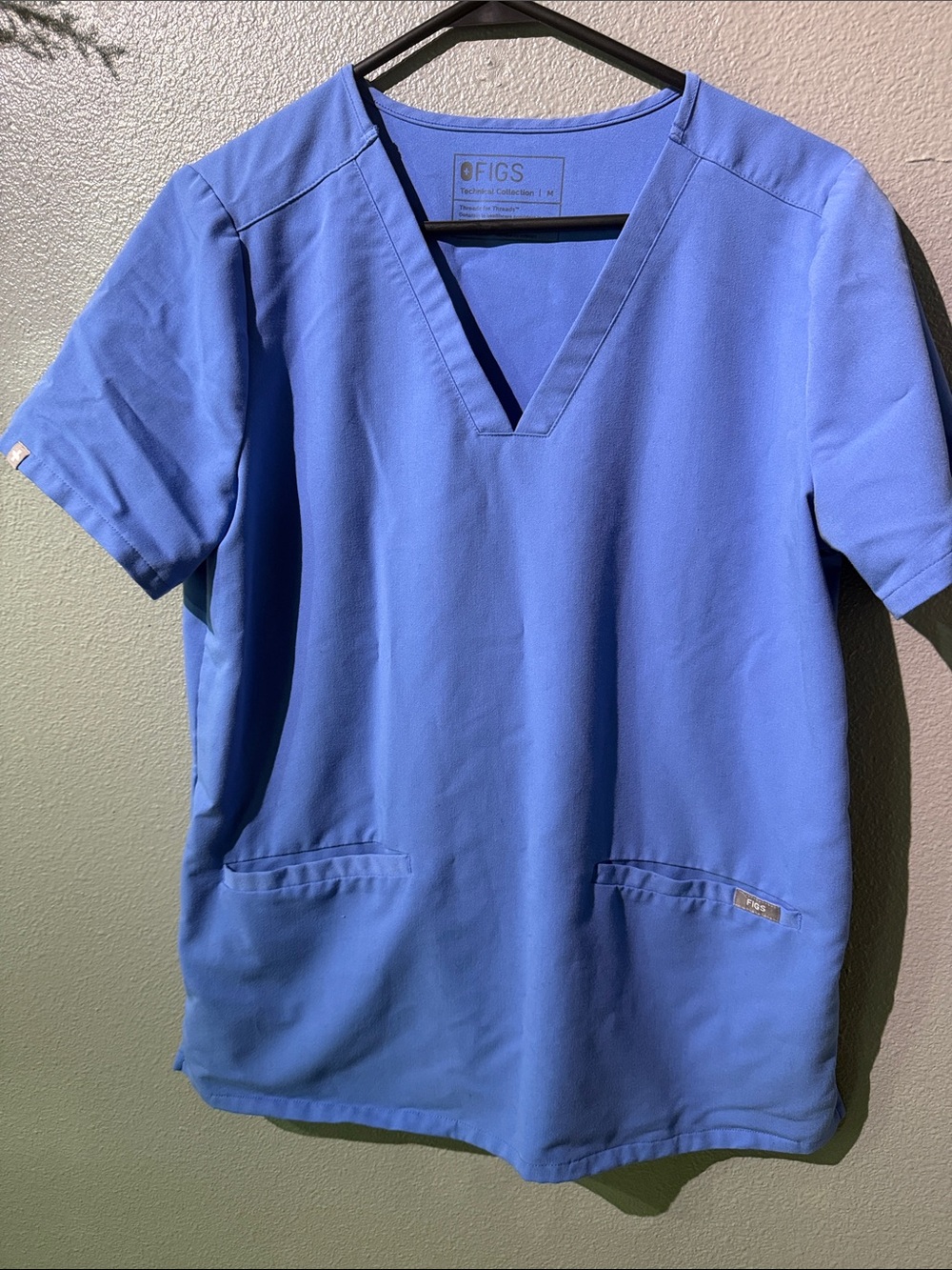 Figs V-Neck Scrub Top in capri blue. Size M. Excellent condition